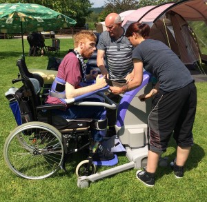 Matthew Picton enjoying a camping holiday, supported by Paul Stenhouse and Lorna Campion